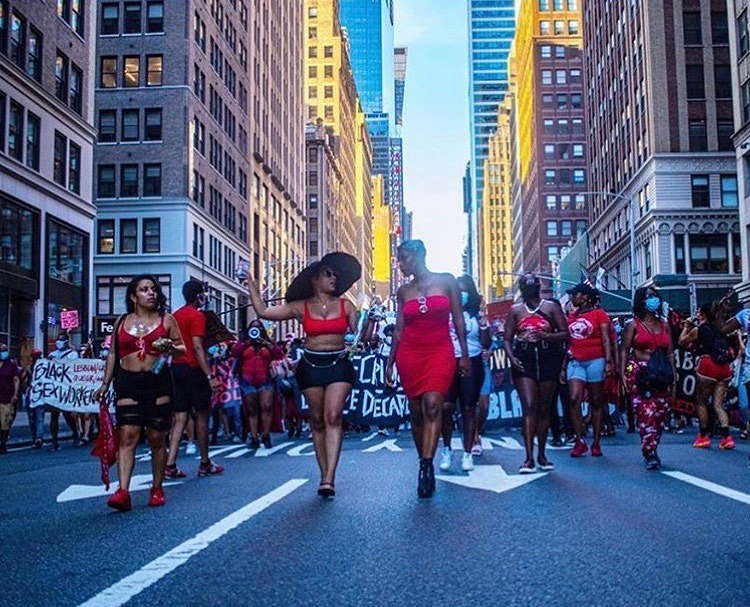 Gizelle Marie leads the march downtown. (Photo: @thegizellemarie/Instagram)